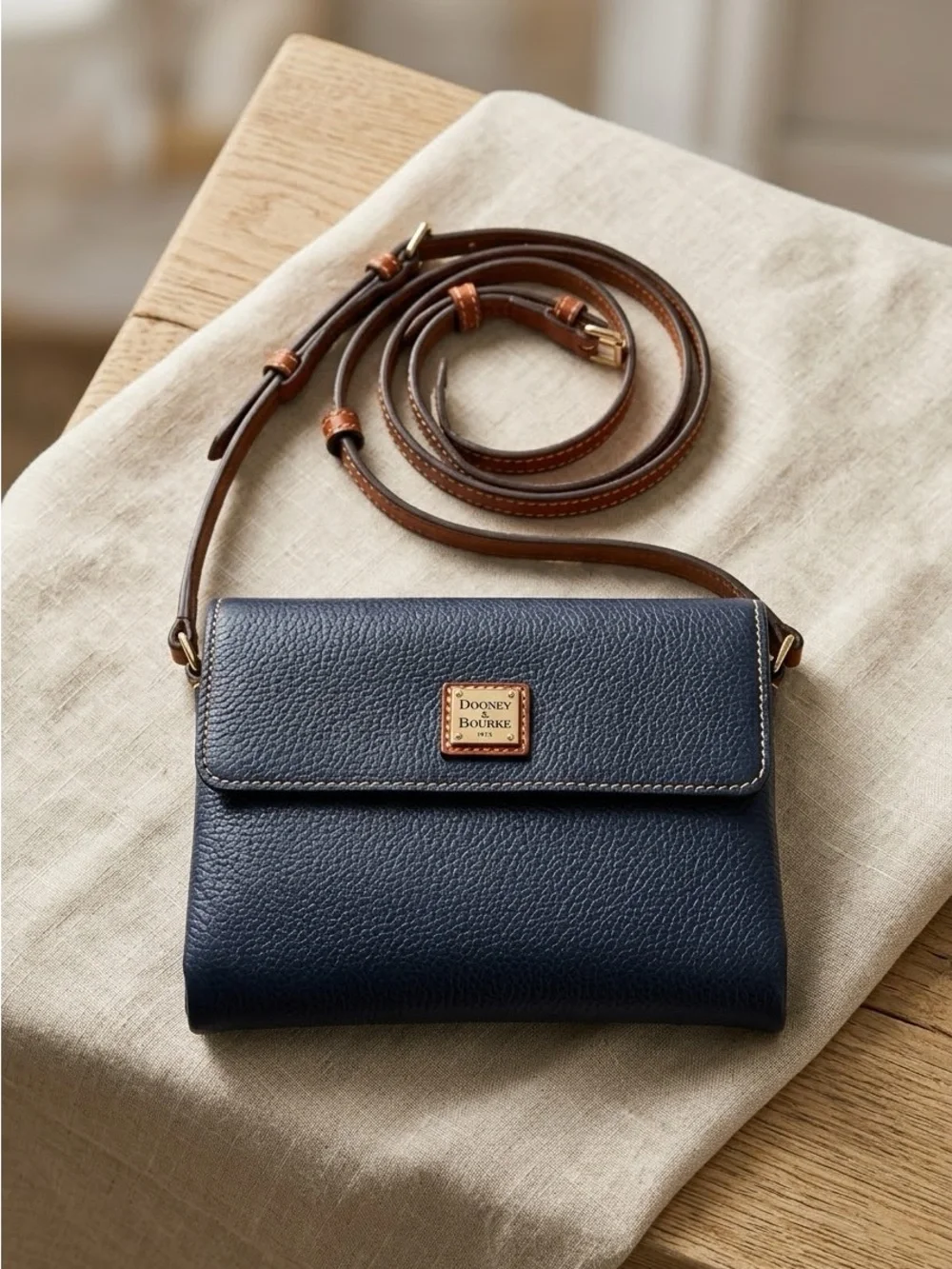 Dooney & Bourke Navy Pebble Leather Crossbody with Brown Strap